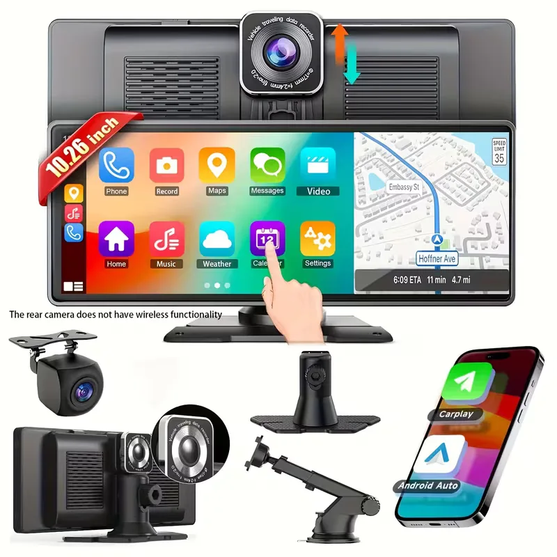 The widescreen unit with a camera module on top showing a CarPlay home screen and a map, with the rear camera, mounting feet, a suction arm and a phone below it