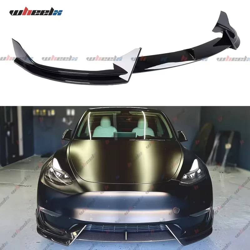 The assembled gloss black lip on white, above a dark olive Tesla Model Y photographed head-on with the lip fitted