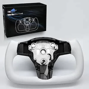 A white yoke-shaped steering wheel in front of its box, with the center hub bare and no airbag or trim cover fitted