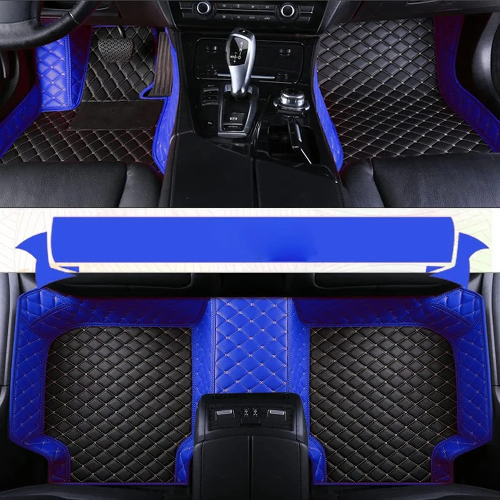 Two-tone floor mats fitted in a car — black quilted body with a wide blue border and trim