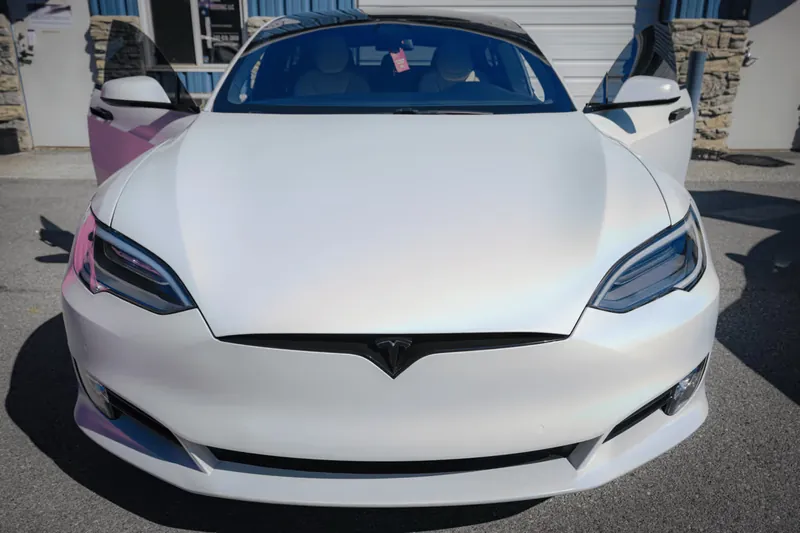Tesla Model S wrapped in satin white, front three-quarter view