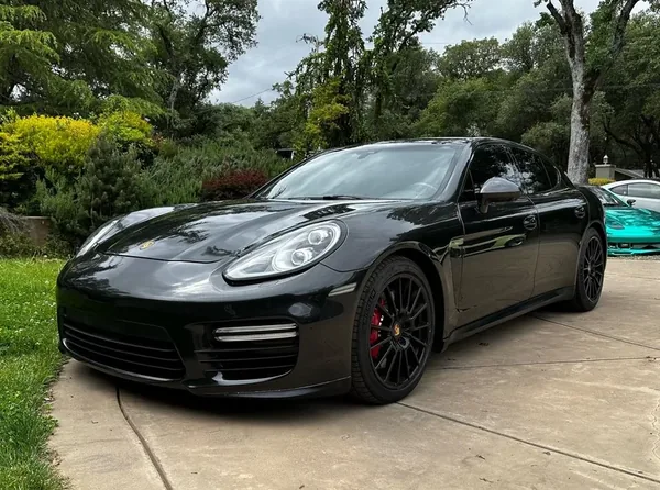 A car finished in Paradox Supreme Color PPF Black Diamond, wrapped by Paradox