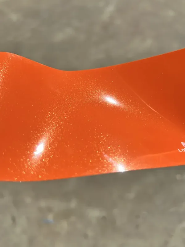 Paradox Supreme Color PPF in Lotus Racing Orange — a length of the film