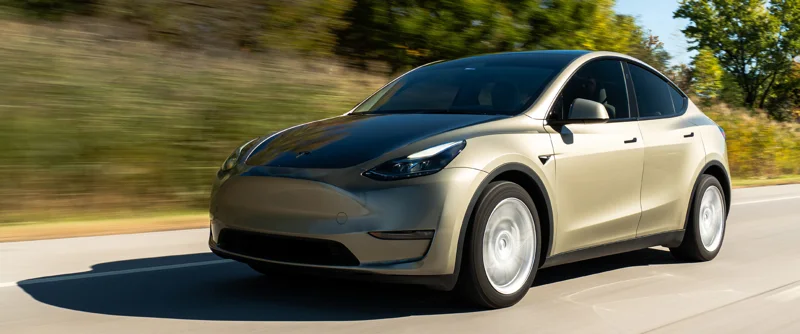 Avery Dennison’s photograph of a Tesla Model Y in PrismaPro Midnight Sand — not a car we wrapped