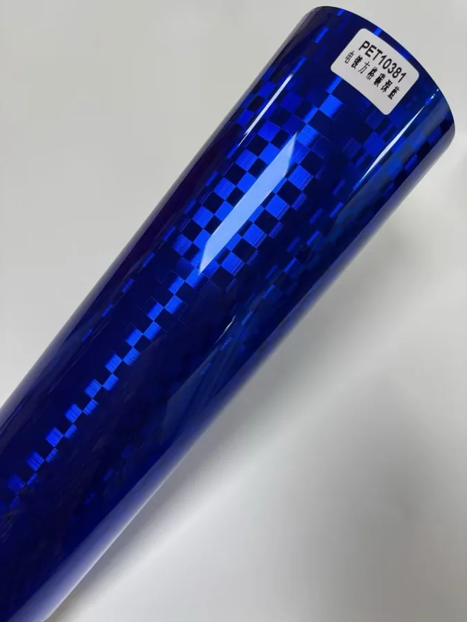 TeslaWrapper Space Film in Gloss Chrome Checkered Carbon Dark Blue