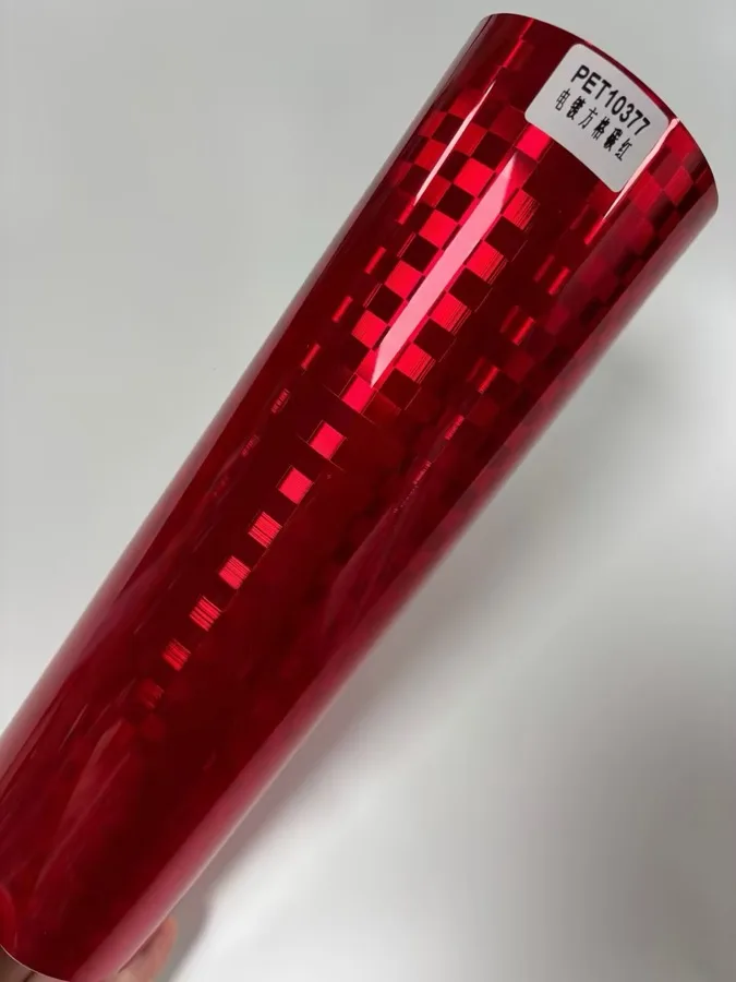 TeslaWrapper Space Film in Gloss Chrome Checkered Carbon Red