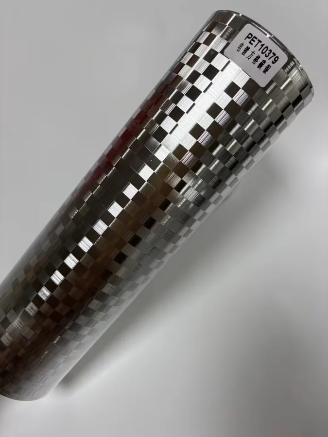 TeslaWrapper Space Film in Gloss Chrome Checkered Carbon Silver