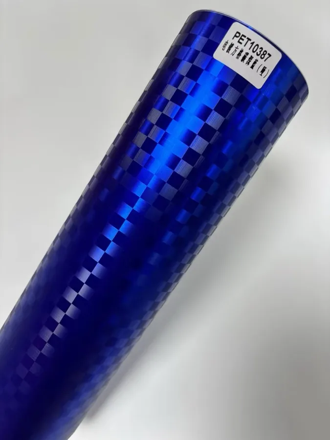 TeslaWrapper Space Film in Matte Chrome Checkered Carbon Dark Blue