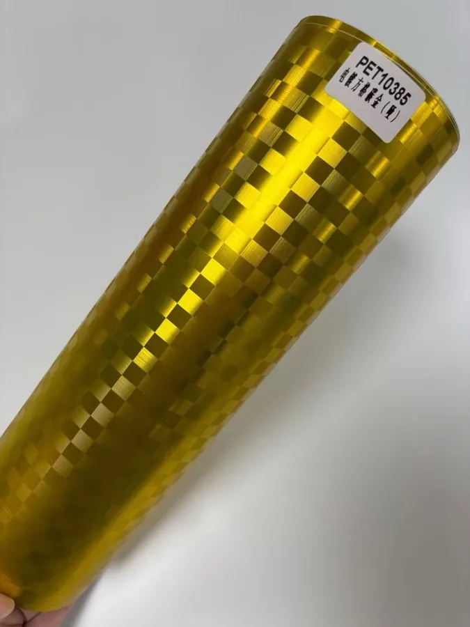TeslaWrapper Space Film in Matte Chrome Checkered Carbon Gold